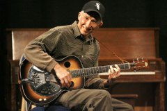 John on stage at Folk Fest as part of "Antique Road Show", 2000s.